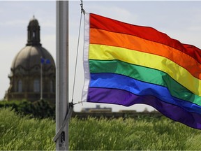 The Pride flag is raised outside the Federal Building in downtown Edmonton on Thursday June 8, 2017.