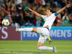 Canada's Christine Sinclair reaches for a ball against Cameroon at the 2019 FIFA Women's World Cup at the Stade de La Mosson in Montpellier, France on June 10, 2019.