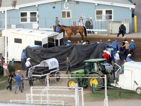 Scene of the crash during heat 7 of the Rangeland Derby chuckwagon races at the Stampede on Thursday, July 11, 2019.