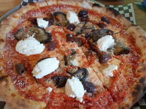 Mimi's "Al Capone" pizza: eggplant, mozza, ricotta, olives, tomato and lots of basil.  Photos by GRAHAM HICKS / EDMONTON SUN