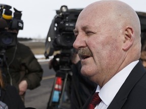 Edmonton Police Service Staff Sgt. Bill Clark seen during a 2018 news conference. Clark will face a disciplinary hearing after a law student complained about comments he made to her class.