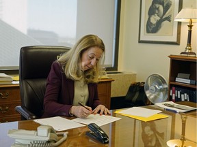Court of Queen's Bench Chief Justice Mary Moreau in her office at the Edmonton Law Courts. The court is taking steps to reduce the amount of paper it produces, but acknowledges funding could be an issue.