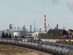 Oil by rail cars are seen on a Canadian Pacific railroad siding near the on ramp to southbound Anthony Henday Drive in Sherwood Park, on Saturday, April 20, 2019. Photo by Ian Kucerak/Postmedia