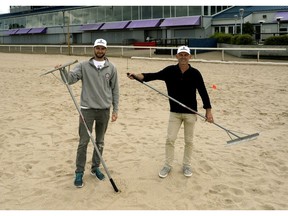 Everett Delorme (left) and Ron Pauk (right) at the new beach volleyball venue in Northlands Park.
