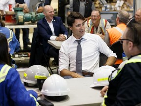 Prime Minister Justin Trudeau meets with energy workers at Kinder Morgan's Trans Mountain pipeline terminal in Edmonton on Friday, July 12, 2019.