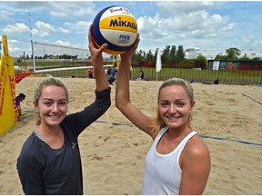 Canadian twins Megan (L) and Nicole McNamara will be competing at the FIVB Beach Volleyball World Tour with 90 teams representing 25 countries at the former Northlands Park Race Track in Edmonton, July 16, 2019.