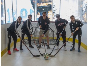 From left, Nacho Martinez, Javi Moyano, former Oiler Jason Strudwich, Junior Hoilett and Michel. Professional footballers toured the Edmonton Oilers dressing room on July 19, 2019. Cardiff plays Real Valladolid in a friendly on Saturday at Commonwealth stadium.