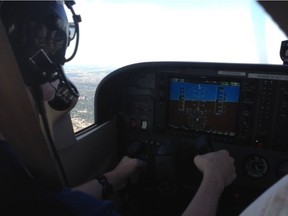 Cadence Layton is seen at the controls of an Edmonton Flying Club plane. Supplied