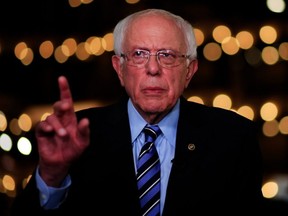 Democratic presidential candidate Sen. Bernie Sanders (I-VT) speaks to the media after the second night of the first Democratic presidential debate on June 27, 2019 in Miami.