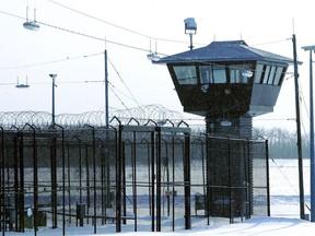 A file photo shows a guard tower at the Edmonton Institution in the city's northeast.