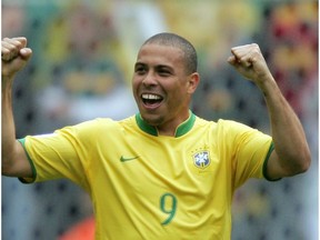 Brazilian forward Ronaldo celebrates after scoring his team's first goal during the round of 16 World Cup football match between Brazil and Ghana at Dortmund's World Cup Stadium, 27 June 2006.