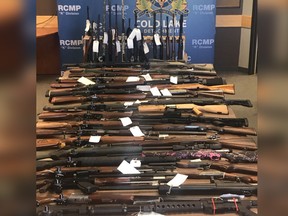 Cold Lake RCMP seized 50 firearms, ammunition and prohibited weapons and charged a man after reports of shots fired at the Cold Lake Marina on July 14, 2019. (Supplied photo/RCMP)