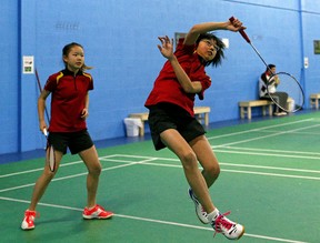Jessie Hou, left, 14, and Alena Yu, 13, are competitive badminton players.