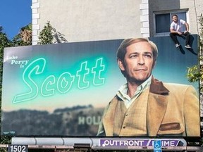 Luke Perry's son climbs his dad's movie billboard in honour of the late actor. Jack Perry/ Instagram