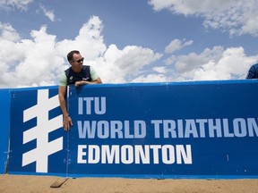 World Triathlon Edmonton president Sheila O'Kelly and World Triathlon Edmonton general manager Stephen Bourdeau pose for a photo as they prepare for next week's event, in Edmonton's Hawrelak Park Sunday July 14, 2019.