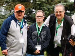 Lyle "Sparky" Kulchisky, left, retired Edmonton Oilers equipment manager and Oilers legend Joey Moss and Tom Braid at the inaugural Joey Moss and Friend's Golf Classic in 2018.