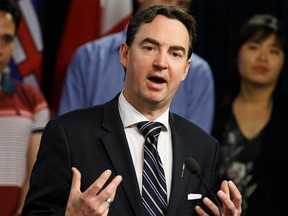 Minister of Labour and Immigration Jason Copping at the Alberta Legislature in Edmonton, on Wednesday, June 19, 2019. Photo by Ian Kucerak/Postmedia