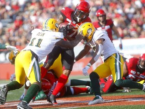 Calgary Stampeders Markeith Ambles is stopped by the Edmonton Eskimos defense in first half CFL action at McMahon stadium in Calgary on Saturday, August 3, 2019. Darren Makowichuk/Postmedia