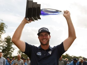 Taylor Pendrith from Canada hoists the trophy after winning the 1932byBateman Open at the Edmonton Country Club on Sunday, Aug. 4, 2019. The tournament is a stop on the PGA Tour Canada's MacKenzie Tour.