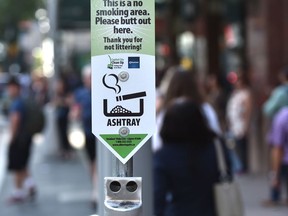 One of the new ashtrays that are in non-smoking areas, installed along Jasper Avenue in Edmonton, August 14, 2019. Ed Kaiser/Postmedia