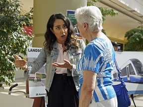 City of Edmonton employee Mariam Ibrahim (left) talks to a concerned citizen at Mill Woods Town Centre on Tuesday August 20, 2019. The City of Edmonton is starting construction on a new and improved Mill Woods Transit Centre. The facility will replace the existing transit centre and offer a closer connection to the future Mill Woods stop on the Valley Line LRT. Members of the public were invited to Mill Woods Town Centre to learn about the final design and what to expect during construction. The new transit centre will feature a large heated shelter, a covered walkway, a "Kiss and Ride" passenger drop-off location, public washrooms and space for future small kiosks.