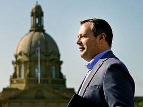 Alberta Premier Jason Kenney discusses the accomplishments of his government in its first 100 days in office and made an announcement that will benefit Indigenous Peoples in Alberta outside the Alberta legislature in Edmonton on Wednesday, Aug. 7, 2019.