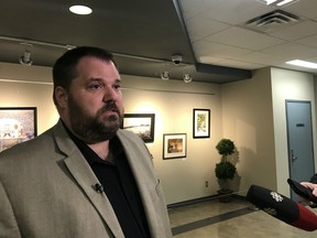 Hugh Willis, legal counsel for the Riverview Estates Condominium Corporation in Fort Saskatchewan, speaks to reporters outside a meeting for condo owners Sunday, Aug 11, 2019.