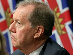 Former RCMP assistant commissioner Peter German looks on at a news conference on money laundering at the legislature in Victoria on May 9, 2019. Police should be able to provide some answers to the families of the B.C. homicide victims and the public after discovering the two suspects dead, says German.