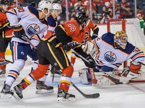 Edmonton Oilers Olivier Rodrigue watches the puck shot by Jakob Pelletier going out of the goal during the battle of Alberta prospects game at Scotiabank Saddledome in Calgary on Tuesday, September 10, 2019. Azin Ghaffari/Postmedia Calgary