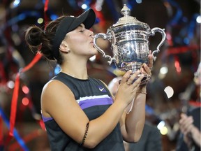 NEW YORK, NEW YORK - SEPTEMBER 07: Bianca Andreescu of Canada celebrates with the championship trophy during the trophy presentation ceremony after winning the Women's Singles final against against Serena Williams of the United States on day thirteen of the 2019 US Open at the USTA Billie Jean King National Tennis Center on September 07, 2019 in the Queens borough of New York City.