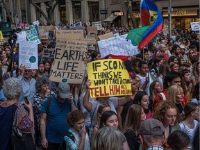 Demonstrators march in climate-crisis rally in Australia Sept. 20, 2019.