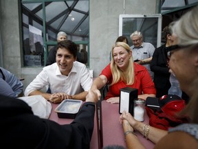 Liberal Leader Justin Trudeau greets supporters alongside Liberal candidate Andrea Kaiser during a campaign stop on Sept. 23, 2019 in Niagara Falls, Ont.