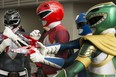 Visitors to the Edmonton Comic & Entertainment Expo pose for photos dressed as the Power Rangers.