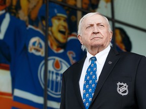 Ted McPhee, a NHL goal judge who has been at the job for 58 years until recent league changes, poses for a portrait outside of Rogers Place in Edmonton, on Monday, Sept. 23, 2019. Photo by Ian Kucerak/Postmedia