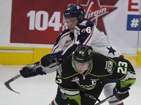 Riley Sawchuk is shown here with the Tri-City Americans in December 2017 pressuring Oil Kings' Colton Kehler during WHL action in Edmonton. Greg  Southam/Postmedia