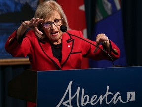 Former Saskatchewan finance minister Janice McKinnon speaks on the report she chaired on the state of Alberta's finances at the McDougall Centre in Calgary on Tuesday Sept. 3, 2019.