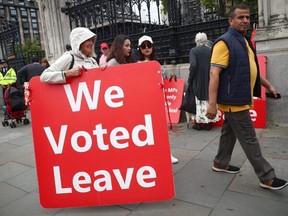 Pro-Brexit demonstrators protest outside the Houses of Parliament in London, Britain on Monday, Sept. 9, 2019.