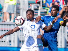 HFX Wanderers FC Defender Elton John (5) and FC Edmonton midfielder Edem Mortotsi battle for the ball on Saturday. Sept. 28, 2019, at Wanderers Stadium in Halifax, N.S.