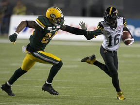 The Edmonton Eskimos' Anthony Orange (24) chases the Hamilton Tiger-Cats' Brandon Banks (16) during first half CFL action at Commonwealth Stadium, in Edmonton Friday Sept. 20, 2019. Photo by David Bloom