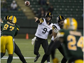 Hamilton Tiger-Cats quarterback Dane Evans (9) makes a pass against the Edmonton Eskimos during first half CFL action at Commonwealth Stadium, in Edmonton Friday Sept. 20, 2019.