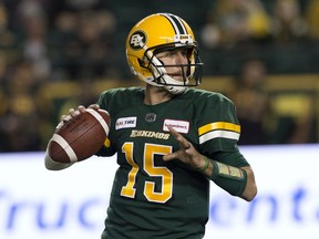 The Edmonton Eskimos' quarterback Logan Kilgore (15) looks for a pass against the Hamilton Tiger-Cats during first half CFL action at Commonwealth Stadium, in Edmonton Friday Sept. 20, 2019.