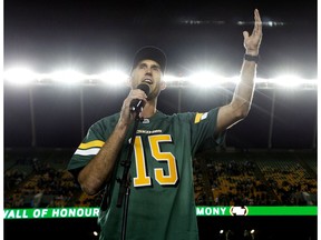 Ricky Ray speaks to the crowd during his Wall of Honour Induction Ceremony during the Edmonton Eskimos and Hamilton Tiger-Cats CFL game at Commonwealth Stadium, in Edmonton Friday Sept. 20, 2019.