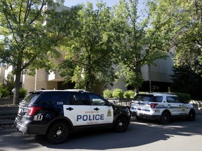 Edmonton police and peace officers at the scene of a potential break-in at the University of Alberta Law Centre, in Edmonton Sept. 3, 2019. Photo by David Bloom