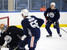 A young fan watches as players battle during Billy Moores Cup action at Edmonton Oilers 2019 Development Camp at the Rogers Place Downtown Community Arena in Edmonton, on Thursday, June 27, 2019.