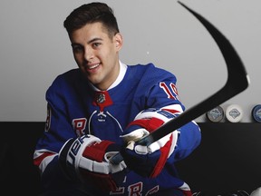 Matthew Robertson poses after being selected 49th overall by the New York Rangers during the 2019 NHL Draft at Rogers Arena on June 22, 2019 in Vancouver.