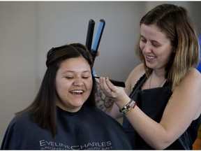 Destiny Cardinal, 18, has her hair done by Harley Bradley during the YEG Youth Connect event at the Boyle Street Plaza, 9538 103 A Ave., in Edmonton Thursday, Sept. 19, 2019.