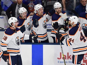UNIONDALE, NEW YORK - OCTOBER 08: The Edmonton Oilers celebrate a goal by Zack Kassian #44 in the second period during their game against the New York Islanders at the NYCB's LIVE Nassau Coliseum on October 08, 2019 in Uniondale, New York.