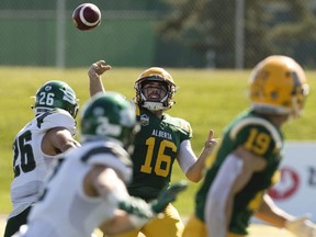 University Alberta Golden Bears' Brad Launhardt (16) looks to pass to Tanner Buchanan (19) during first half Canada West action against the University of Saskatchewan Huskies at Foote Field, in Edmonton Saturday Sept. 21, 2019. Photo by David Bloom