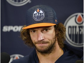 Edmonton Oilers goalie Mike Smith talks to reporters in Edmonton on Thursday October 3, 2019, the day after his team won their season opening game against the Vancouver Canucks.