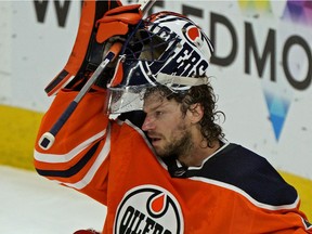 Edmonton Oilers goalie Mike Smith takes a break during NHL game action against the Los Angeles Kings in Edmonton on Saturday October 5, 2019.